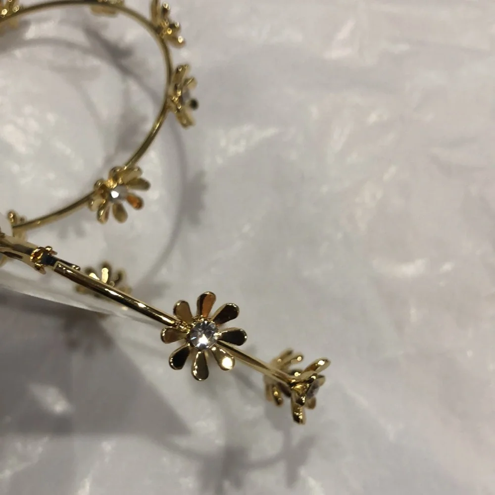 Jessica‎ Simpson cubic zirconia studded flower gold plated hoop earrings new
